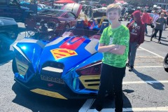 boy-at-car-show-superman-car