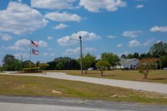 JT2A4387-Entrance-with-Flags-scaled